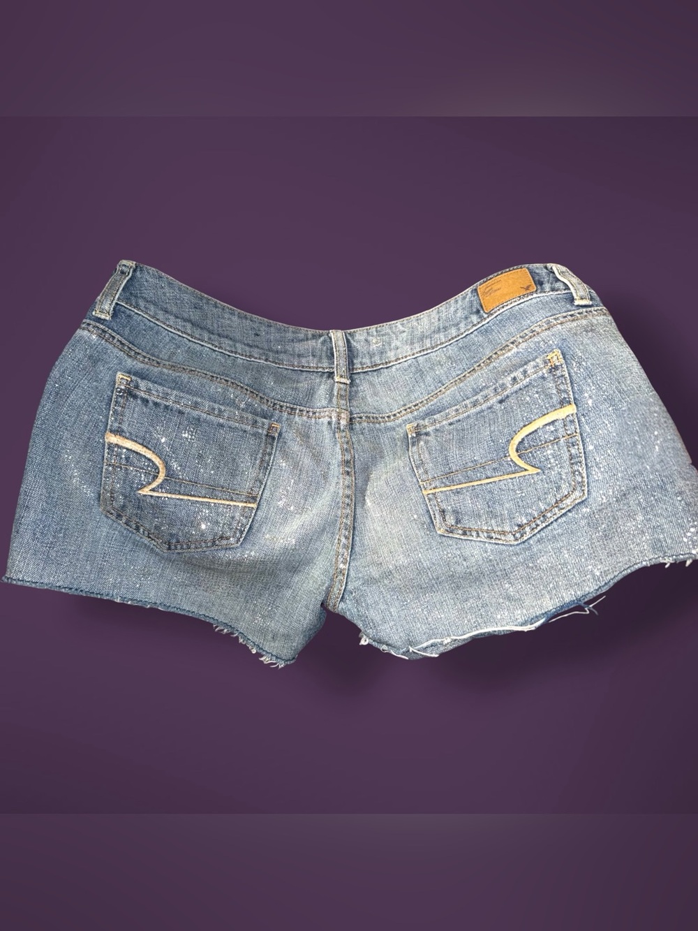American Eagle Outfitters Distressed Glitter Light Blue Denim Cutoff Shorts